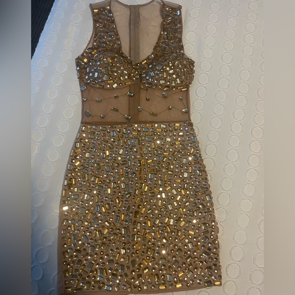 This dress was bought in Brazil, should fit S/M